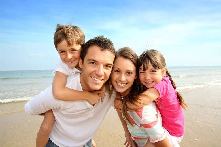 young family at the beach in brandon fl