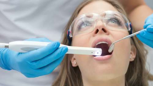 young woman getting her regular dental checkup in brandon fl